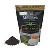 McEntee's Fine Teas Loose Leaf Tea Master Blend packaging with tea leaves and a cup on a white background