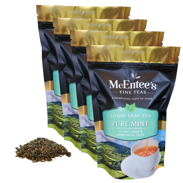 Packaging of McEntee's Fine Teas Pure Mint loose leaf tea with tea leaves and a cup on a white background