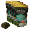 McEntee's Fine Teas Organic Sencha Green Tea packages with loose leaf tea on a white background