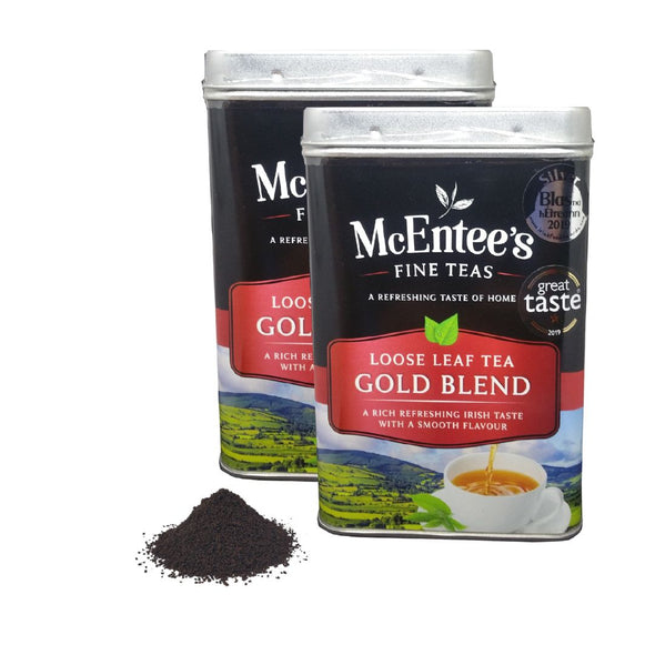 Two tins of McEntee's Fine Teas Loose Leaf Tea Gold Blend on a white background.
