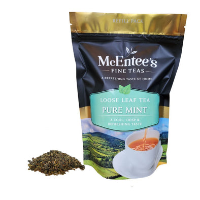 McEntee's Fine Teas Pure Mint loose leaf tea package with tea leaves on a white background