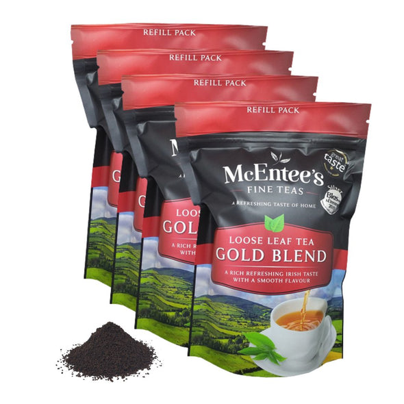 Multiple packages of McEntee's Fine Teas Gold Blend loose leaf tea on a white background.